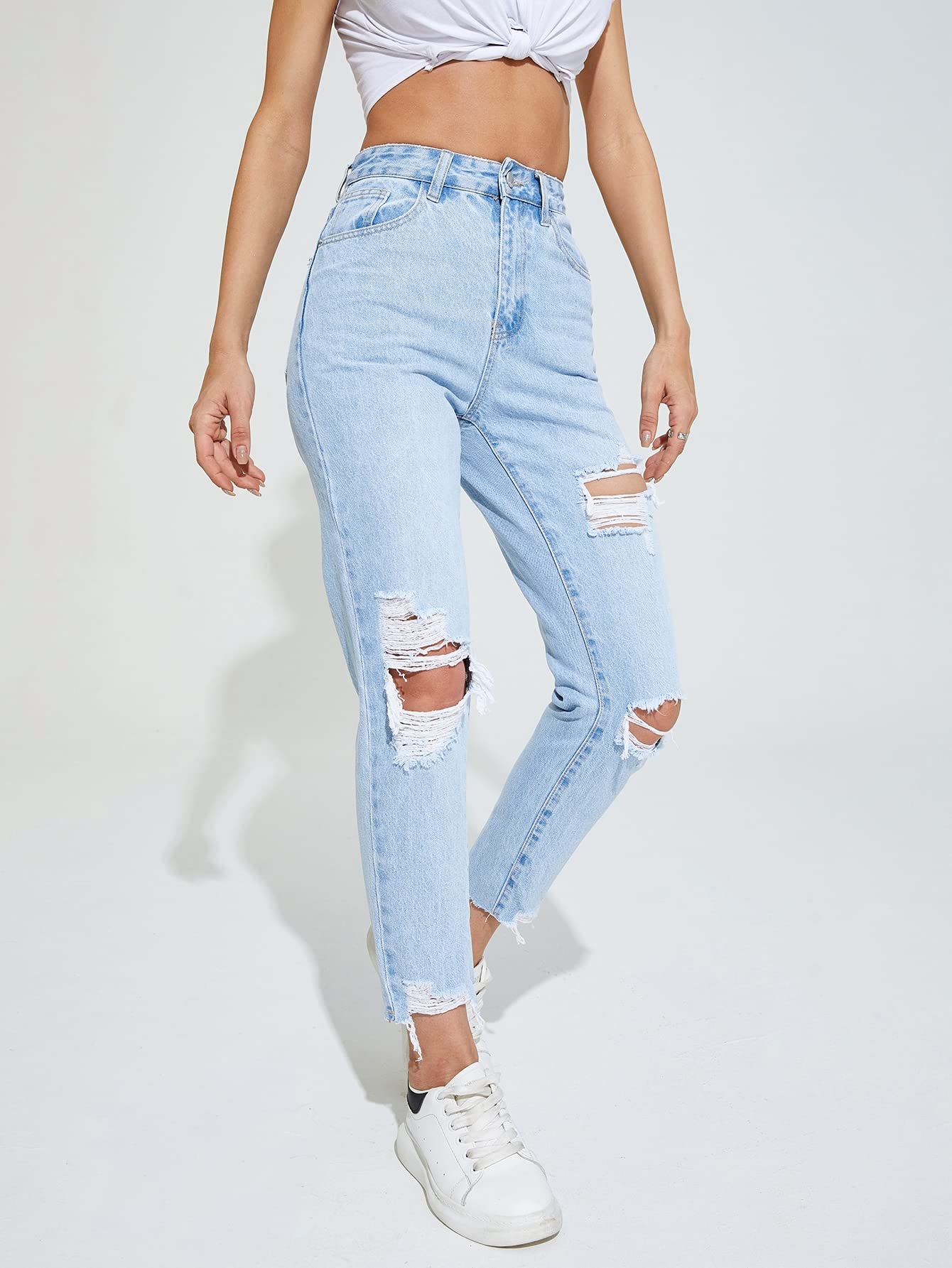 Light wash ripped jeans are a fashion staple that embody casual chic and vintage charm. When it comes to pairing them with jackets,