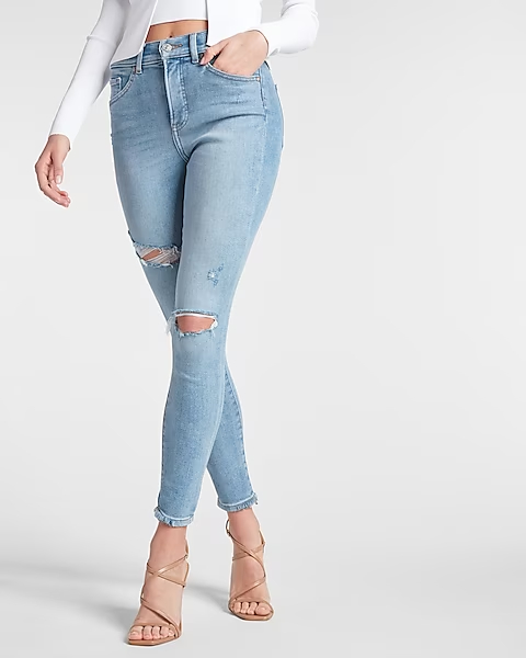 Light wash ripped jeans are a fashion staple that embody casual chic and vintage charm. When it comes to pairing them with jackets,